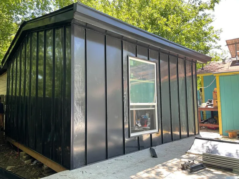 Black standing seam metal wall panels for Metal Roof Installation in Briar