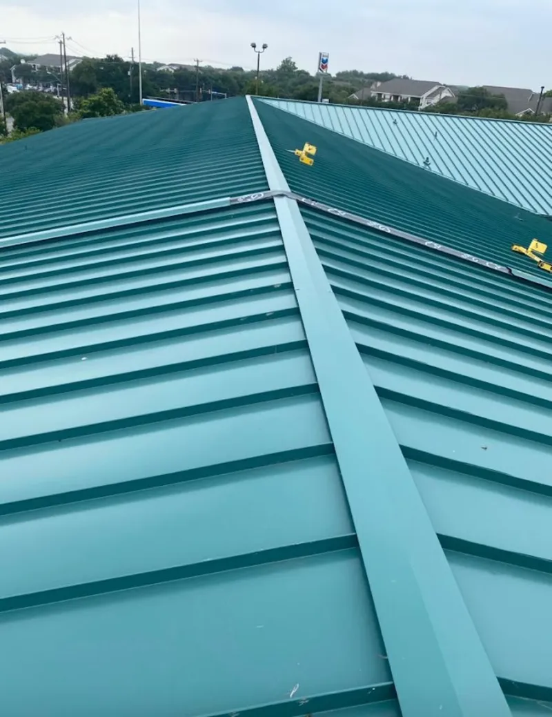 Green commercial metal roof ridge and valley for Metal Roof Repair in Briar